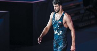 پوستر اتحادیه جهانی کشتی با تصویر حسن یزدانی